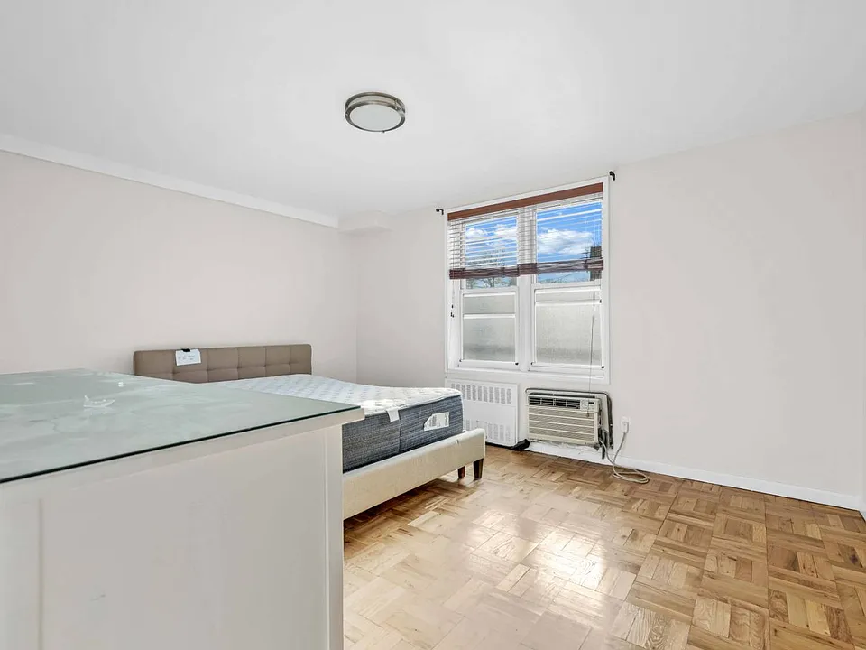 2nd room of co-op apartment building at 21050 41st Ave Apt 1C in Flushing, NY