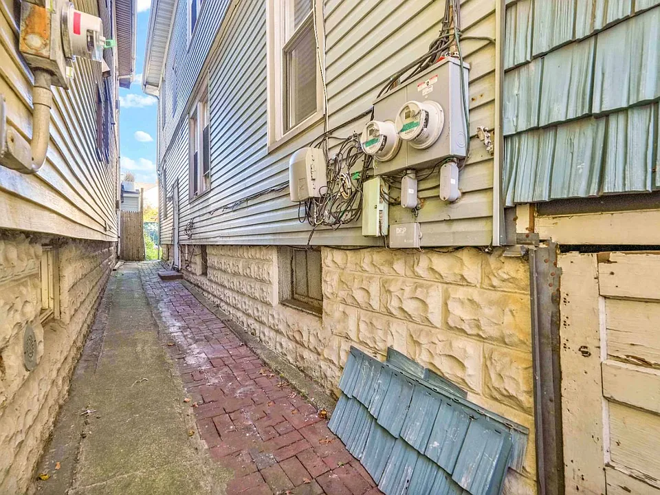 Backside St of Single Family Home for Sale in 7-06 College Point, NY 11356