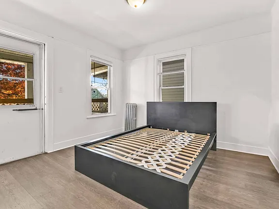 Bed in Room View of Single Family Home for Sale in 7-06 College Point, NY 11356