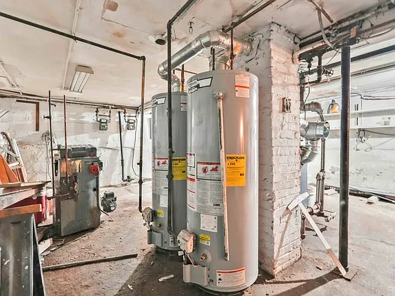 Gizar Area of Single Family Home for Sale in 7-06 College Point, NY 11356