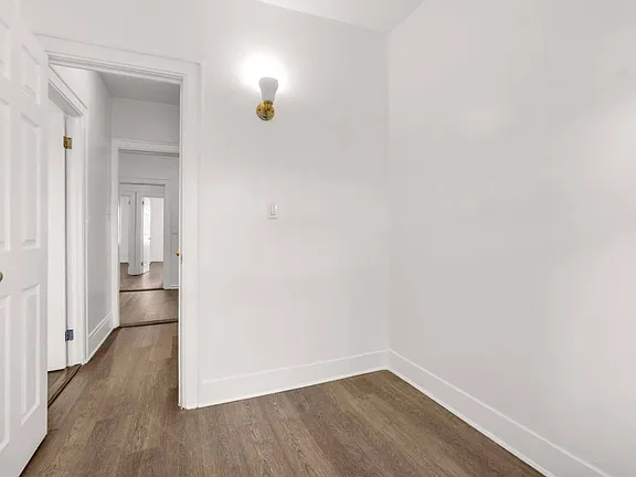 Inside Room Opened Door View of Single Family Home for Sale in 7-06 College Point, NY 11356