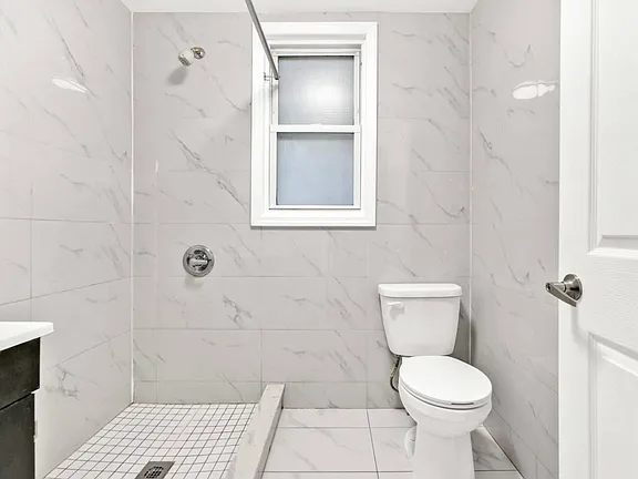 Inside Washroom Front View of Single Family Home for Sale in 7-06 College Point, NY 11356