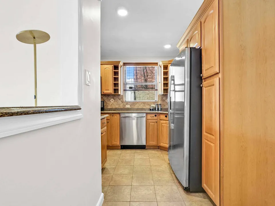 Kitchen Side View of co-op apartment building at 21050 41st Ave Apt 1C in Flushing, NY