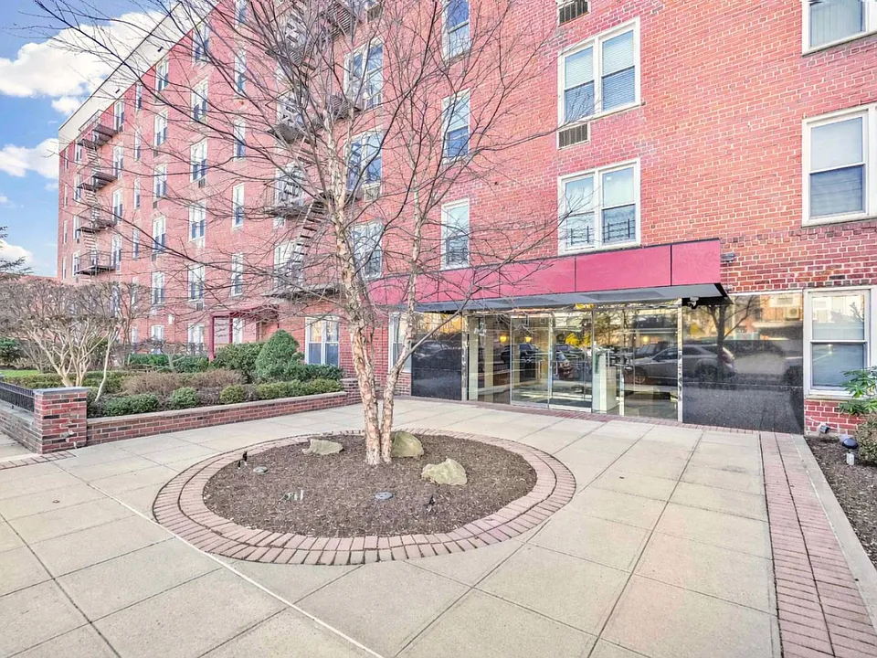 Outside view of co-op apartment building at 21050 41st Ave Apt 1C in Flushing, NY