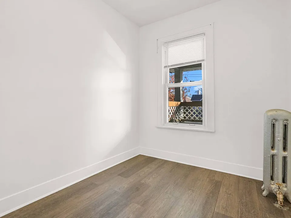 Room Inside Window View of Single Family Home for Sale in 7-06 College Point, NY 11356