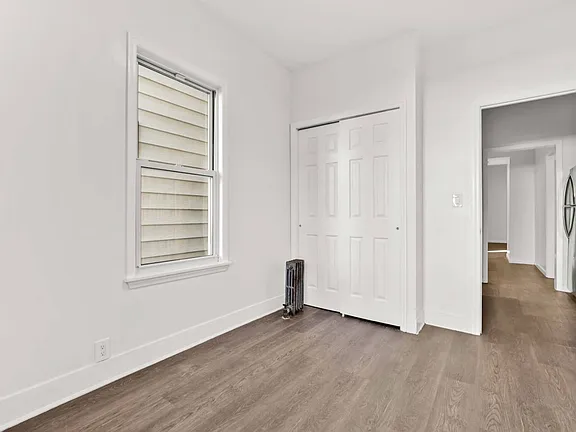 Room Inside Window & Washroom Door View of Single Family Home for Sale in 7-06 College Point, NY 11356