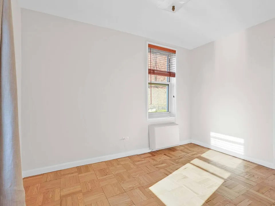 Room View in Sunlight of co-op apartment building at 21050 41st Ave Apt 1C in Flushing, NY