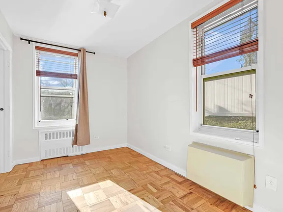 Room View in morning of co-op apartment building at 21050 41st Ave Apt 1C in Flushing, NY