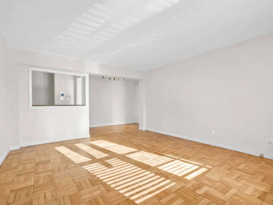 Room View in the morning with sunlight of co-op apartment building at 21050 41st Ave Apt 1C in Flushing, NY