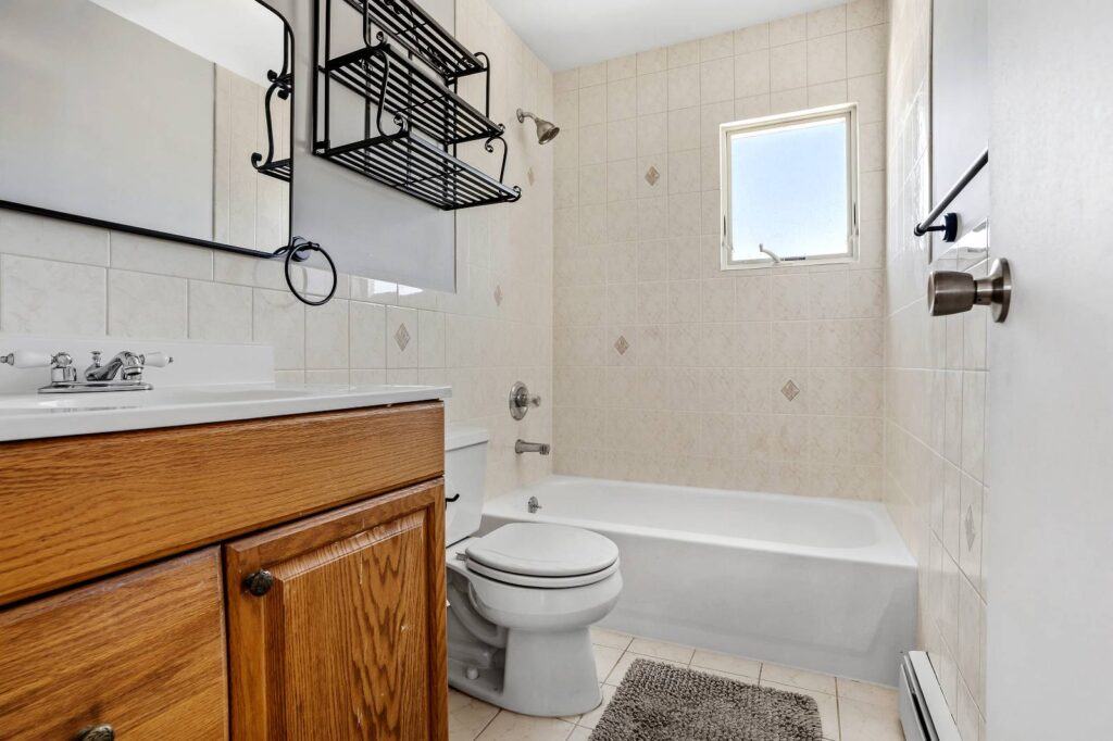 House for Sale in Freeport NY – Washroom and Bathtub View