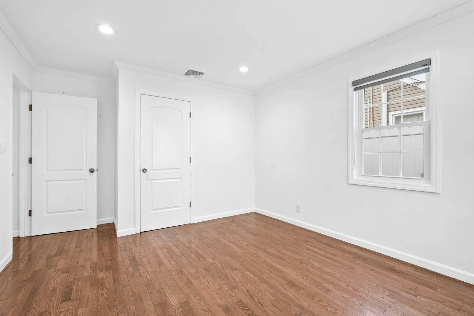 House for sale in East Meadow NY - Inside view of room and washroom doors